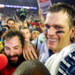 Patriots quarterback Tom Brady celebrates with Defensive Coordinator Matt Patricia after Super Bowl XLIX at the University of Phoenix Stadium, Feb. 1, 2015.