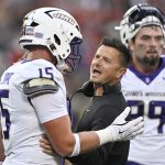 Sep 5, 2025; Louisville, Kentucky, USA; James Madison Dukes head coach Bob Chesney talks with tight end Lacota Dippre (15) during the first quarter against the Louisville Cardinals at L&N Federal Credit Union Stadium. Mandatory Credit: Jamie Rhodes-Imagn Images