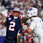 Oct 5, 2025; Orchard Park, New York, USA; New England Patriots linebacker Harold Landry III (2) pressures Buffalo Bills quarterback Josh Allen (17) during the first half at Highmark Stadium.
