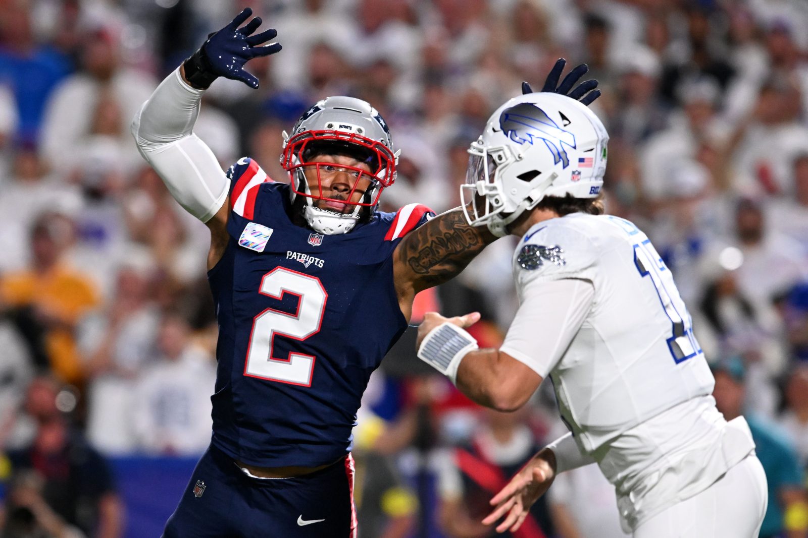 Oct 5, 2025; Orchard Park, New York, USA; New England Patriots linebacker Harold Landry III (2) pressures Buffalo Bills quarterback Josh Allen (17) during the first half at Highmark Stadium.