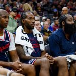 Oct 15, 2025; Sacramento, California, USA; Los Angeles Clippers guard Chris Paul (3) and forward Kawhi Leonard (2) and guard James Harden (1) sit on the bench during the fourth quarter against the Sacramento Kings at Golden 1 Center.
