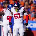 Oct 19, 2025; Denver, Colorado, USA; New York Giants linebacker Abdul Carter (51) reacts after a play against the Denver Broncos during the second half at Empower Field at Mile High. Mandatory Credit: Ron Chenoy-Imagn Images