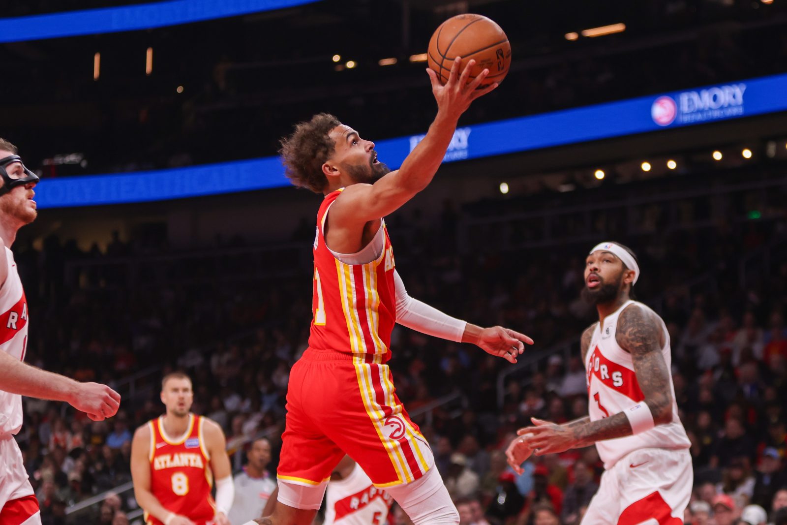 Oct 22, 2025; Atlanta, Georgia, USA; Atlanta Hawks guard Trae Young (11) shoots against the Toronto Raptors in the first quarter at State Farm Arena.
