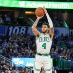 Nov 9, 2025; Orlando, Florida, USA; Boston Celtics guard Anfernee Simons (4) shoots a three point basket during the second quarter against the Orlando Magic at Kia Center. Mandatory Credit: Mike Watters-Imagn Images