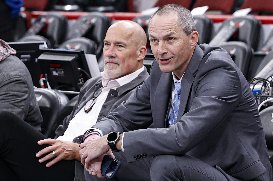 Nov 21, 2025; Chicago, Illinois, USA; Chicago Bulls Executive Vice President of Basketball Operations Arturas Karnisovas (R) sits next to Senior Advisor of Basketball Operations John Paxson (L) before an NBA game against the Miami Heat at United Center.