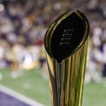 Nov 22, 2025; Atlanta, Georgia, USA; A view of the college football playoff national championship trophy on the sidelines of a game between the Georgia Tech Yellow Jackets and Pittsburgh Panthers in the first quarter at Bobby Dodd Stadium at Hyundai Field.