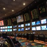 Nov 26, 2025; Las Vegas, NV, USA; Gambling odds are displayed at the BetMGM Sportsbook at MGM Grand hotel and casino.