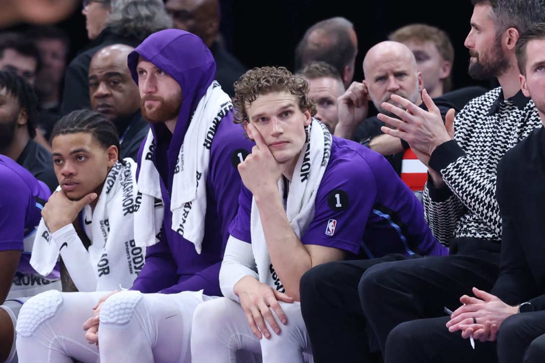 Nov 30, 2025; Salt Lake City, Utah, USA; Utah Jazz forward Lauri Markkanen (middle) watches play against the Houston Rockets during the second half at Delta Center. Mandatory Credit: Rob Gray-Imagn Images