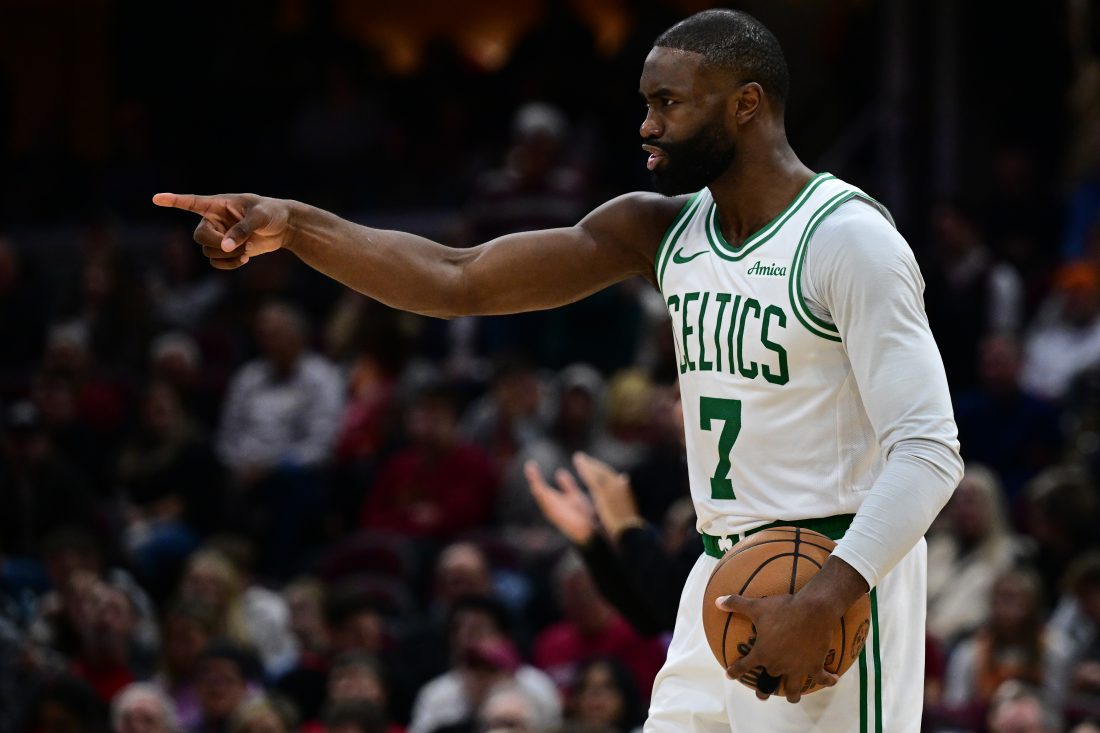 Nov 30, 2025; Cleveland, Ohio, USA; Boston Celtics guard Jaylen Brown (7) reacts after a defensive play during the second half against the Cleveland Cavaliers at Rocket Arena. Mandatory Credit: David Dermer-Imagn Images