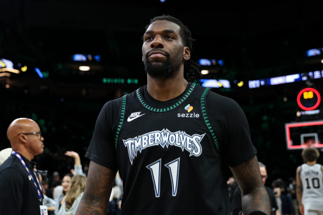 Nov 30, 2025; Minneapolis, Minnesota, USA; Minnesota Timberwolves center Naz Reid (11) reacts after the teams win against the San Antonio Spurs after the game at Target Center. Mandatory Credit: Matt Krohn-Imagn Images