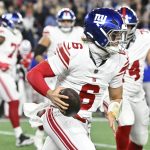 Dec 1, 2025; Foxborough, Massachusetts, USA; New York Giants quarterback Jaxson Dart (6) carries the ball during the first quarter against the New England Patriots at Gillette Stadium. Mandatory Credit: Eric Canha-Imagn Images