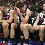 Dec 3, 2025; Chicago, Illinois, USA; Chicago Bulls forward Matas Buzelis (14), center, and guard Josh Giddey (3) after the second half against the Brooklyn Nets at the United Center. Mandatory Credit: Matt Marton-Imagn Images
