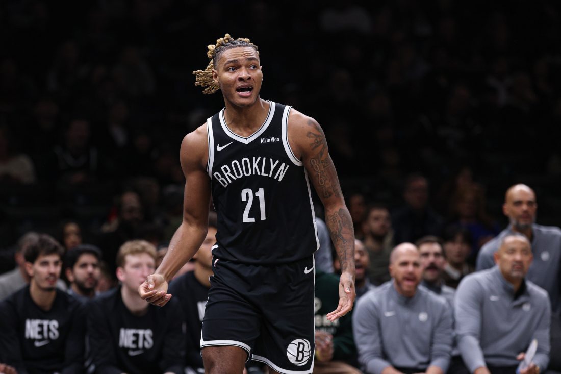 Dec 6, 2025; Brooklyn, New York, USA; Brooklyn Nets forward Noah Clowney (21) reacts after a play during the second half against the New Orleans Pelicans at Barclays Center. Mandatory Credit: Vincent Carchietta-Imagn Images