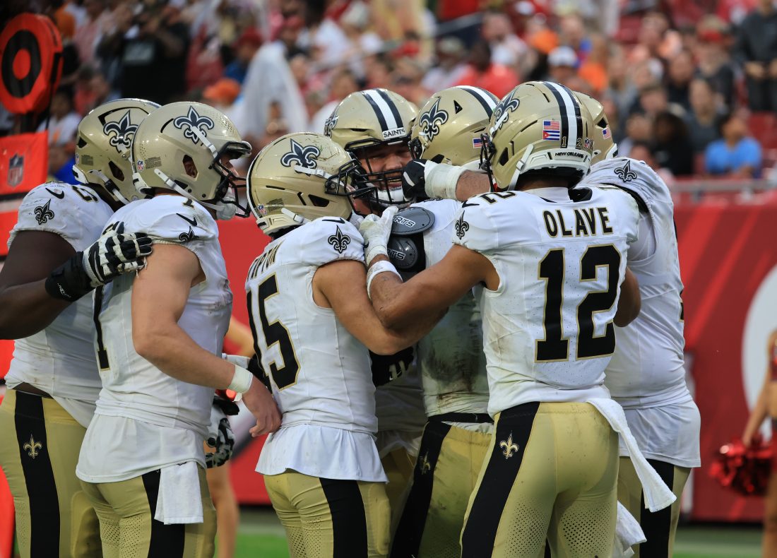 Dec 7, 2025; Tampa, Florida, USA; New Orleans Saints quarterback Tyler Shough (6) celebrates a touchdown with teammates during the fourth quarter against the Tampa Bay Buccaneers at Raymond James Stadium. Mandatory Credit: Kim Klement Neitzel-Imagn Images
