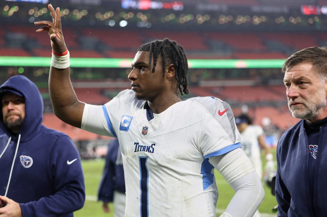 Dec 7, 2025; Cleveland, Ohio, USA; Tennessee Titans quarterback Cam Ward (1) acknowledges the crowd after the game against the Cleveland Browns at Huntington Bank Field. Mandatory Credit: Scott Galvin-Imagn Images