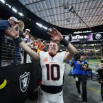 Dec 7, 2025; Paradise, Nevada, USA; Denver Broncos quarterback Bo Nix (10) high five fans following a game against the Las Vegas Raiders at Allegiant Stadium. Mandatory Credit: Kirby Lee-Imagn Images