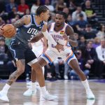 Dec 7, 2025; Salt Lake City, Utah, USA; Utah Jazz guard Keyonte George (3) dribbles the ball as Oklahoma City Thunder guard Cason Wallace (22) defends during the first quarter at Delta Center. Mandatory Credit: Rob Gray-Imagn Images