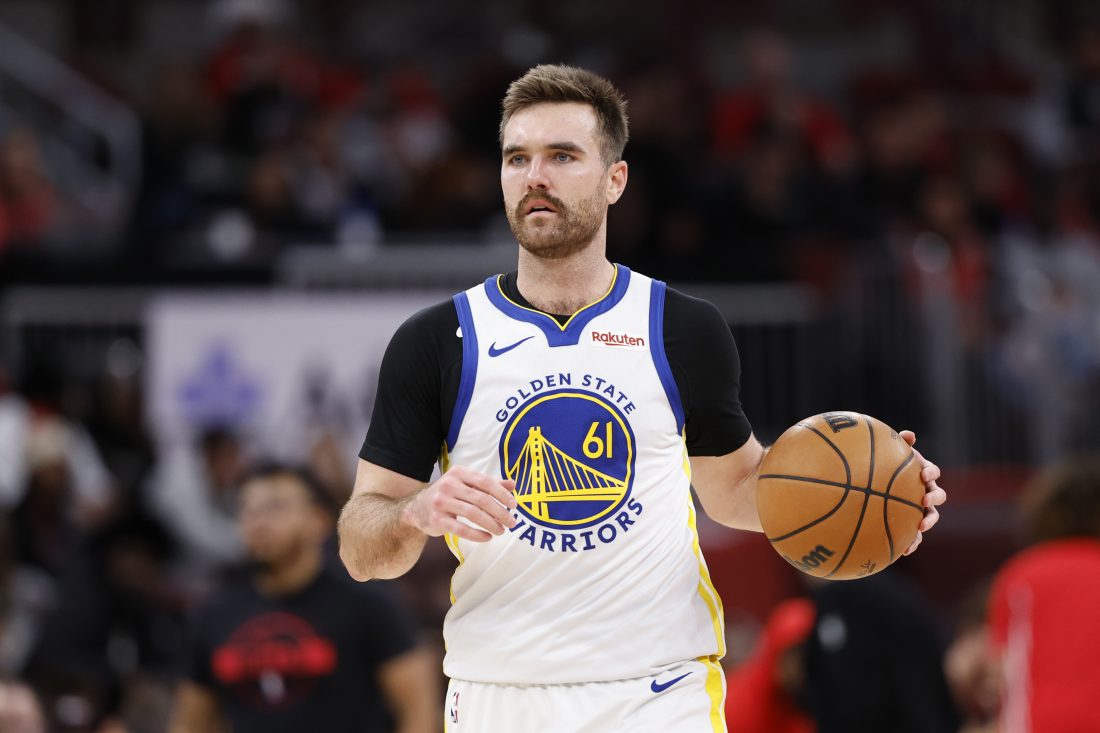 Dec 7, 2025; Chicago, Illinois, USA; Golden State Warriors guard Pat Spencer (61) brings the ball up court against the Chicago Bulls during the second half at United Center. Mandatory Credit: Kamil Krzaczynski-Imagn Images