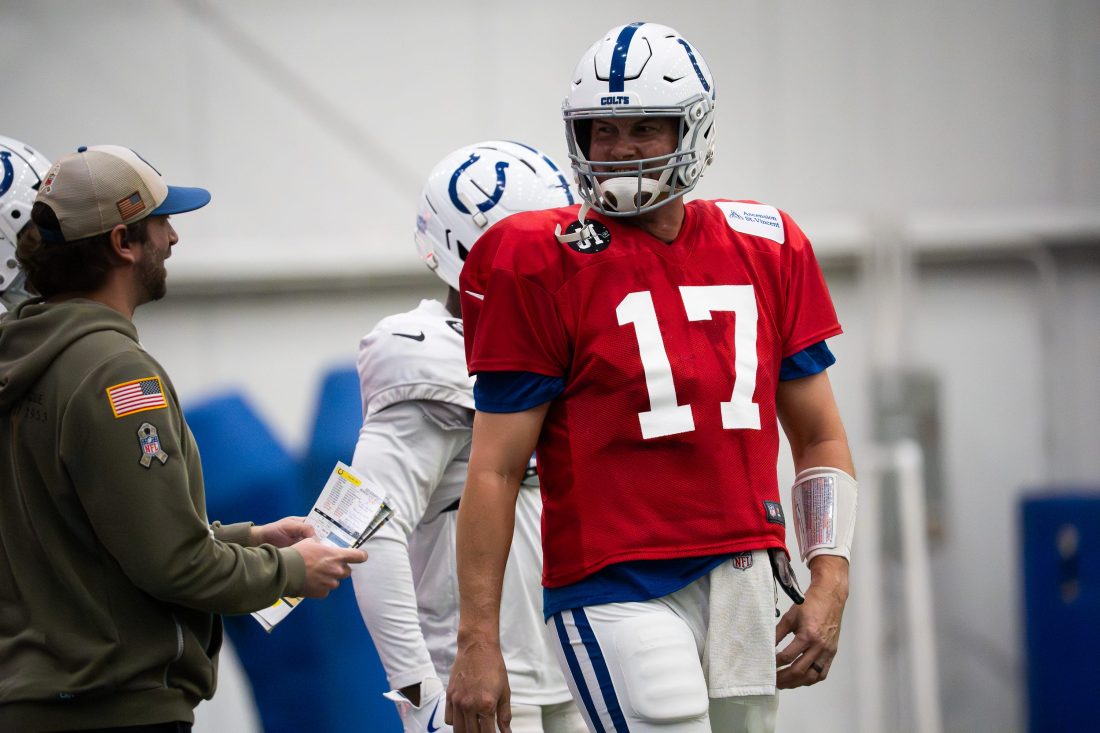 Indianapolis Colts quarterback Philip Rivers (17) talks with quarterbacks coach Cam Turner on Wednesday, Dec. 10, 2025, during practice at the Colts training facility in Indianapolis.