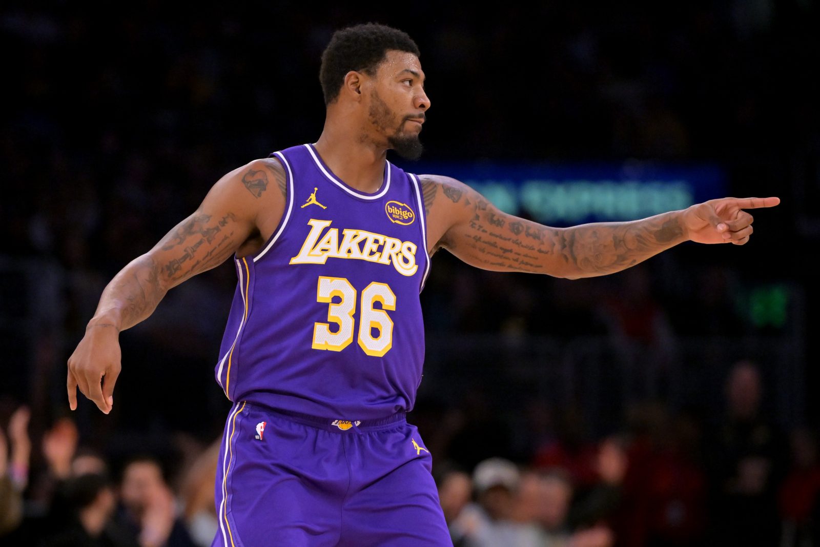 Dec 10, 2025; Los Angeles, California, USA; Los Angeles Lakers guard Marcus Smart (36) reacts after a 3-point basket during the second half against the San Antonio Spurs at Crypto.com Arena.