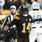 Dec 15, 2025; Pittsburgh, Pennsylvania, USA; Pittsburgh Steelers running back Kenneth Gainwell (14) celebrates a touchdown scored by tight end Connor Heyward (83) in the second quarter against the Miami Dolphins at Acrisure Stadium. Mandatory Credit: Barry Reeger-Imagn Images