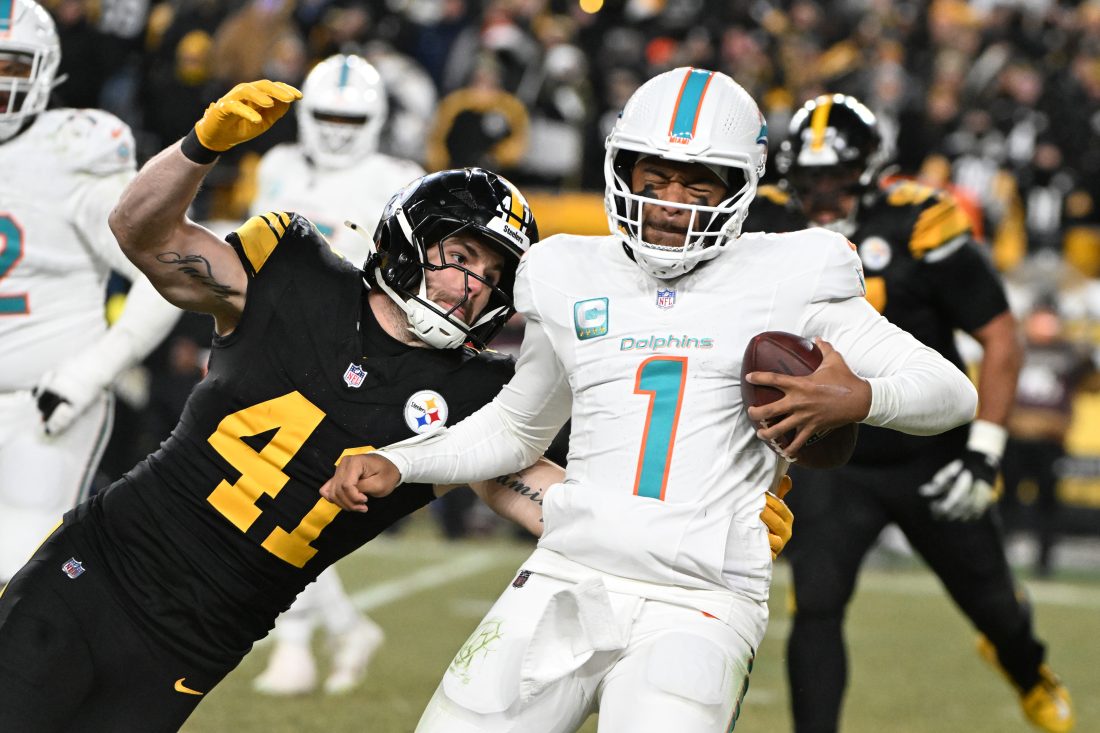 Dec 15, 2025; Pittsburgh, Pennsylvania, USA; Pittsburgh Steelers linebacker Payton Wilson (41) sacks Miami Dolphins quarterback Tua Tagovailoa (1) in the third quarter at Acrisure Stadium. Mandatory Credit: Barry Reeger-Imagn Images