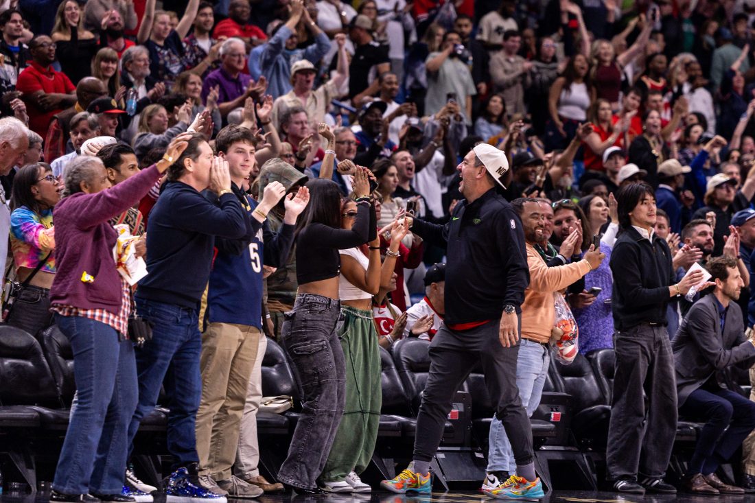 Dec 18, 2025; New Orleans, Louisiana, USA; New Orleans Pelicans fans react to a play against the Houston Rockets during over time at Smoothie King Center. Mandatory Credit: Stephen Lew-Imagn Images