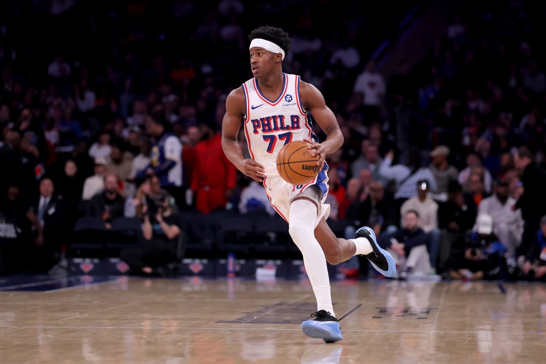 Dec 19, 2025; New York, New York, USA; Philadelphia 76ers guard VJ Edgecombe (77) brings the ball up court against the New York Knicks during the third quarter at Madison Square Garden.