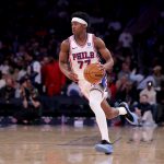 Dec 19, 2025; New York, New York, USA; Philadelphia 76ers guard VJ Edgecombe (77) brings the ball up court against the New York Knicks during the third quarter at Madison Square Garden.