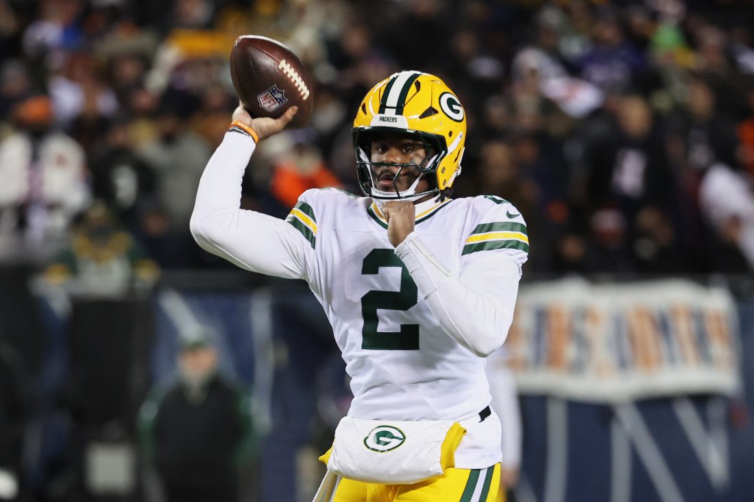 Dec 20, 2025; Chicago, Illinois, USA; Green Bay Packers quarterback Malik Willis (2) throws a pass against the Chicago Bears during the third quarter at Soldier Field. Mandatory Credit: Mike Dinovo-Imagn Images