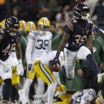 Dec 20, 2025; Chicago, Illinois, USA; Chicago Bears cornerback Josh Blackwell (39) celebrates recovering an onside kick mishandled by Green Bay Packers wide receiver Romeo Doubs (87) in the fourth quarter at Soldier Field.