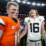 Dec 21, 2025; Denver, Colorado, USA; Denver Broncos quarterback Bo Nix (10) and Jacksonville Jaguars quarterback Trevor Lawrence (16) meet after the game at Empower Field at Mile High. Mandatory Credit: Ron Chenoy-Imagn Images