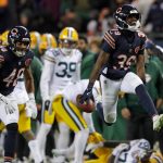 Chicago Bears cornerback Josh Blackwell (39) celebrates recovering an onside kick mishandled by Green Bay Packers wide receiver Romeo Doubs (87) in the fourth quarter during their football game Saturday, December 20, 2025, at Soldier Field in Chicago, Illinois.