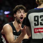 Dec 22, 2025; Portland, Oregon, USA; Portland Trail Blazers forward Deni Avdija (8) reacts toward a referee after getting called for a foul during the second half against the Detroit Pistons at Moda Center. Mandatory Credit: Troy Wayrynen-Imagn Images