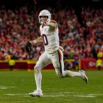 Dec 25, 2025; Kansas City, Missouri, USA; Denver Broncos quarterback Bo Nix (10) throws a toucdown pass during the fourth quarter at GEHA Field at Arrowhead Stadium.