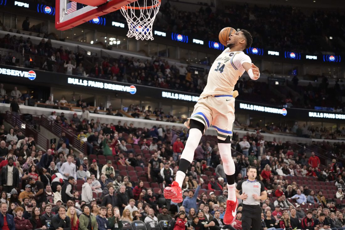 Dec 27, 2025; Chicago, Illinois, USA; Milwaukee Bucks forward Giannis Antetokounmpo (34) goes up for a dunk against the Chicago Bulls during the second half at United Center. Mandatory Credit: David Banks-Imagn Images