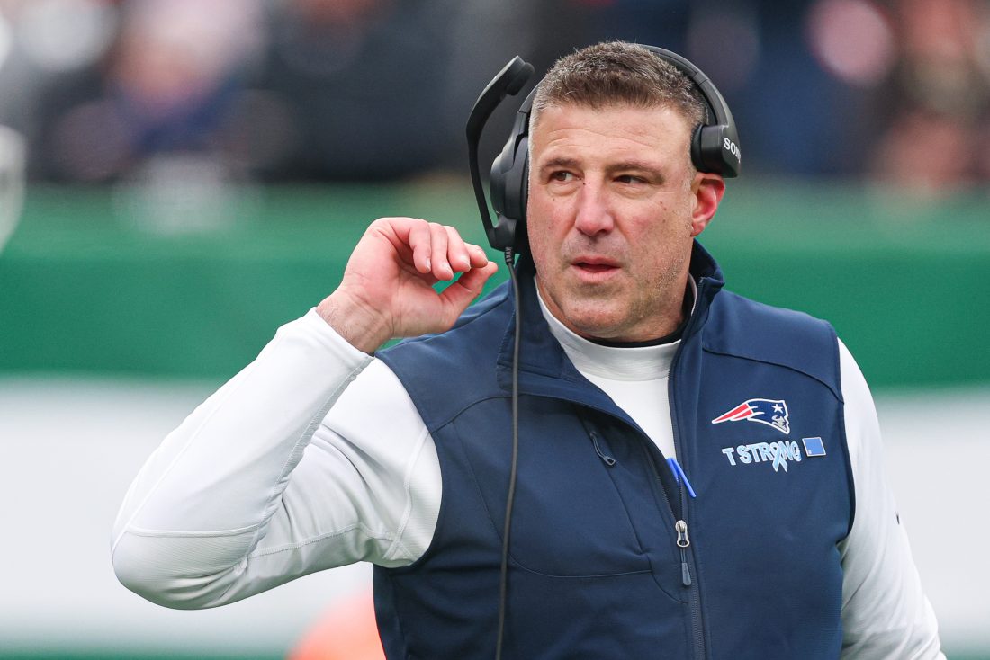 Dec 28, 2025; East Rutherford, New Jersey, USA; New England Patriots head coach Mike Vrabel looks on during the first half against the New York Jets at MetLife Stadium.