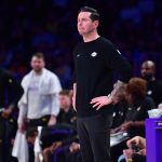 Dec 30, 2025; Los Angeles, California, USA; Los Angeles Lakers head coach JJ Redick watches game action against the Detroit Pistons during the first half at Crypto.com Arena. Mandatory Credit: Gary A. Vasquez-Imagn Images