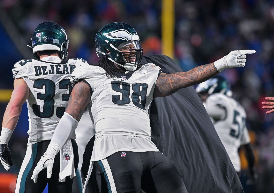 Dec 28, 2025; Orchard Park, New York, USA; Philadelphia Eagles defensive tackle Jalen Carter (98) reacts to winning a game against the Buffalo Bills at Highmark Stadium.