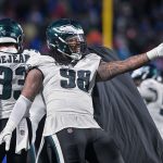 Dec 28, 2025; Orchard Park, New York, USA; Philadelphia Eagles defensive tackle Jalen Carter (98) reacts to winning a game against the Buffalo Bills at Highmark Stadium.