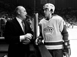 Unknown date; Los Angeles, CA USA; FILE PHOTO; Los Angeles Kings forward Dave Taylor (18) talks with long time NHL official Lou McClary during a game at the Great Western Forum. Mandatory Credit: Jayne Kamin-Oncea-USA TODAY Sports