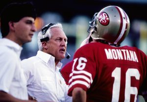 San Francisco 49ers head coach Bill Walsh and quarterback Joe Montana (16) on the sidelines against the Cincinnati Bengals during Super Bowl XXIII at Dolphin Stadium. Credit: USA TODAY Sports