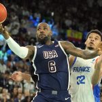 Aug 10, 2024; Paris, France; United States guard LeBron James (6) shoots against France power forward Victor Wembanyama (32) in the first half in the men's basketball gold medal game during the Paris 2024 Olympic Summer Games at Accor Arena. Mandatory Credit: Kyle Terada-USA TODAY Sports