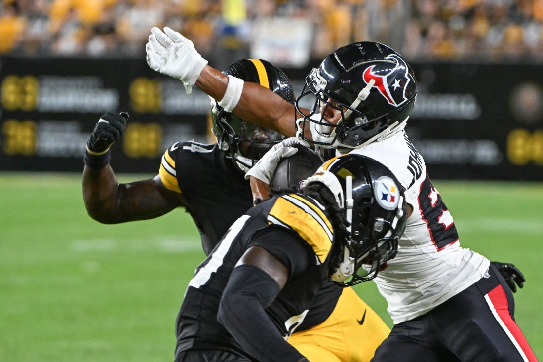 Aug 9, 2024; Pittsburgh, Pennsylvania, USA; Houston Texans wide receiver Johnny Johnson III (88) runs following a catch as Pittsburgh Steelers linebacker Easton Gibbs defends during the fourth quarter at Acrisure Stadium. Mandatory Credit: Barry Reeger-USA TODAY Sports