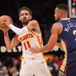 Dec 2, 2024; Atlanta, Georgia, USA; Atlanta Hawks guard Trae Young (11) is defended by New Orleans Pelicans guard CJ McCollum (3) in the second quarter at State Farm Arena. Mandatory Credit: Brett Davis-Imagn Images