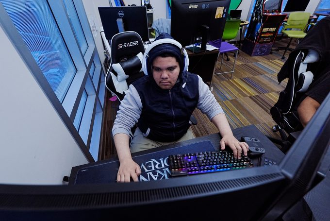 Victor Quintana is ranked third in the Network of Academic and Scholastic Esports Federation's Worldwide Mario Kart Leaderboard for fall 2024 after a recent competition. He is ranked second for the season. He is part of the Central Library Liberators Esports team. Quintana, who was hanging out in the digital gaming room at the library Dec. 5, 2024, was playing against Fortnight, his favorite game.