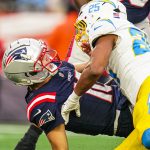 Dec 28, 2024; Foxborough, Massachusetts, USA; New England Patriots quarterback Drake Maye (10) on the field against Los Angeles Chargers linebacker Junior Colson (25) second half at Gillette Stadium. Mandatory Credit: David Butler II-Imagn Images