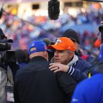 Jan 12, 2025; Orchard Park, New York, USA; Buffalo Bills head coach Sean McDermott and Denver Broncos head coach Sean Payton shake hands following the AFC wild card game at Highmark Stadium. Mandatory Credit: Gregory Fisher-Imagn Images