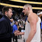 Jan 12, 2025; Dallas, Texas, USA; Dallas Mavericks guard Luka Doncic (left) talks with Denver Nuggets center Nikola Jokic (right) after the game at the American Airlines Center. Mandatory Credit: Jerome Miron-Imagn Images