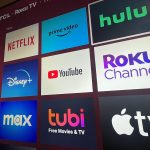 Multiple streaming services appear on a Roku TV.